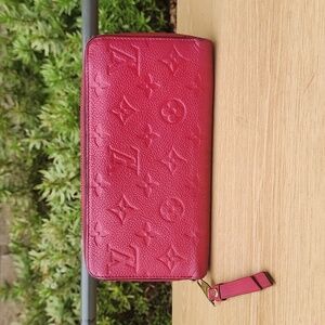 LOUIS VUITTON Round Zipper Monogram Empreinte Leather Zippy Wallet